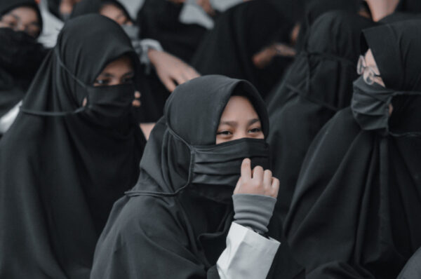 Students take to streets over hijab ban in India