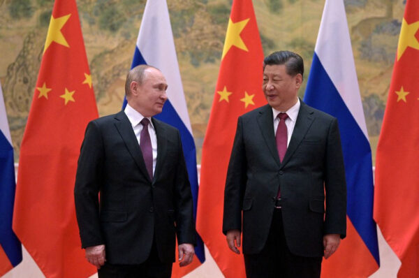 Xi-Putin huddle